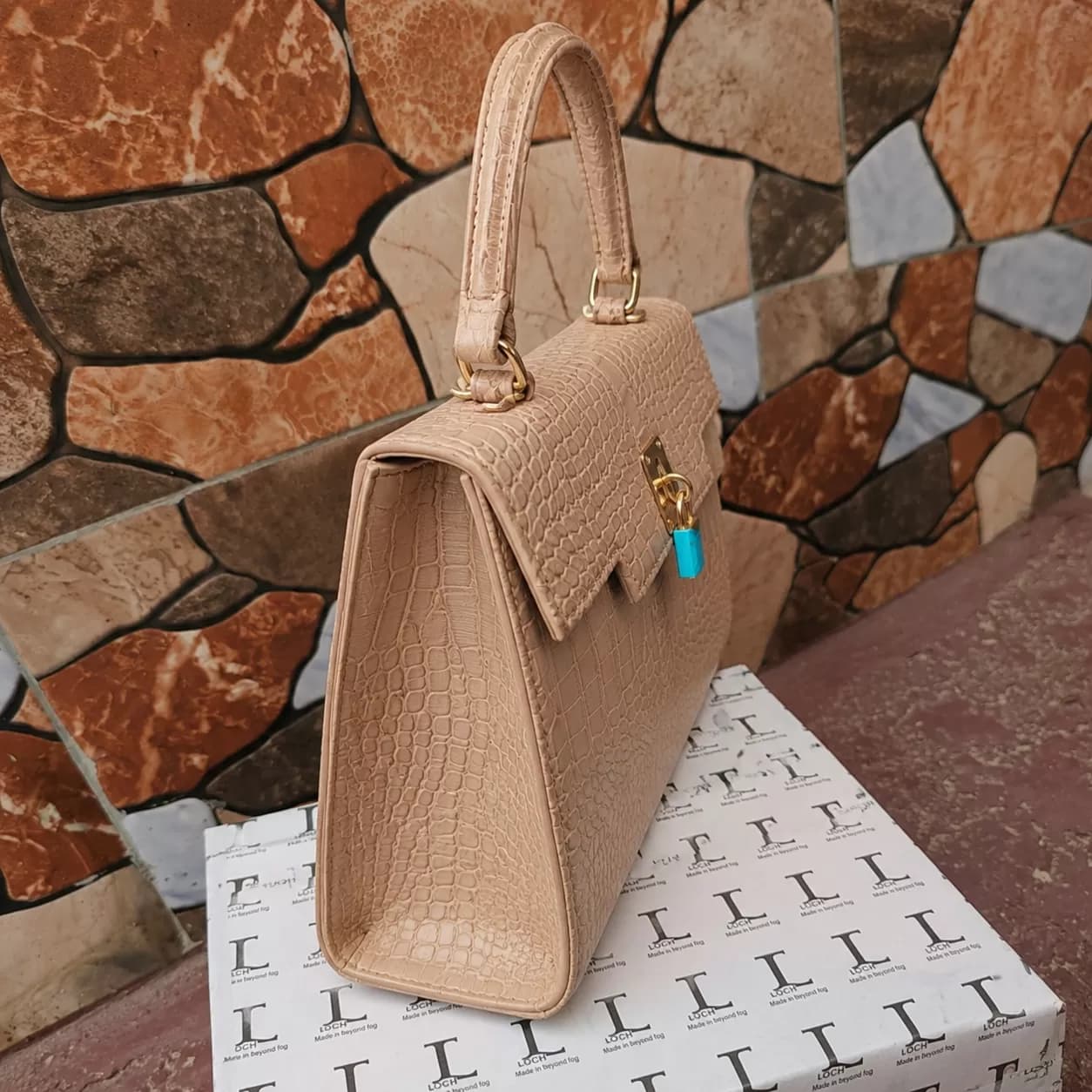 Elegant Nude Crocodile-Embossed Top-Handle Handbag with Accent Lock — image 2
