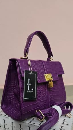 Women’s Purple Crocodile-Textured Structured Handbag with Gold-Tone Lock & Detachable Shoulder Strap's Image