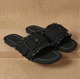 Women's Chic Black Fringe-Trim Slip-On Flat Sandals with Buckle Detail's Image