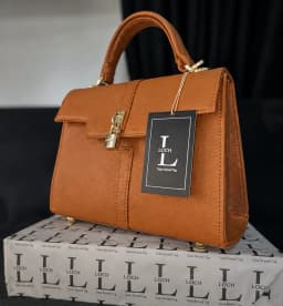 Elegant Structured Brown Top-Handle Handbag's Image