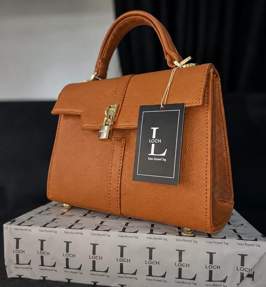 Elegant Structured Brown Top-Handle Handbag — image 1