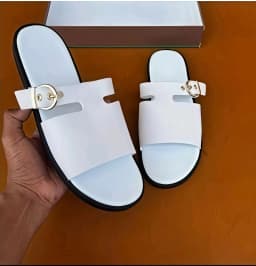 Women's Elegant White Slide Sandals with Gold Buckle Accent's Image