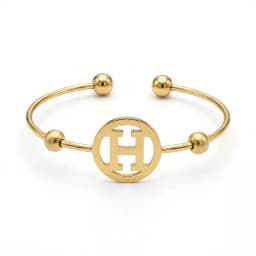 H cut out Gold bangle's Image