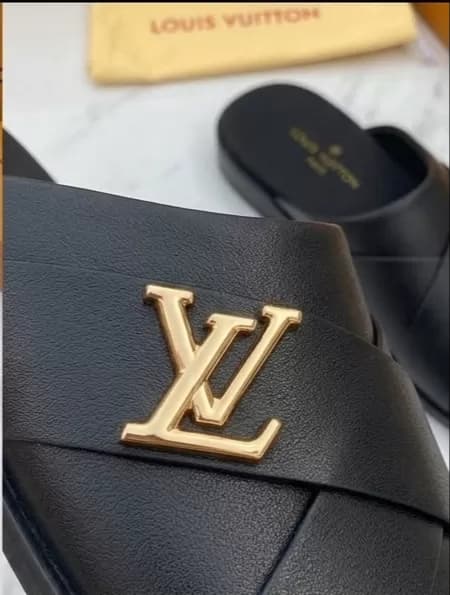 Luxury Black Cross-Strap Mule Loafers with Gold LV Hardware — image 3