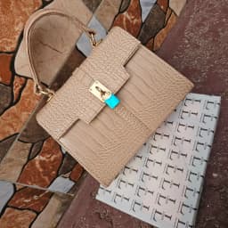 Elegant Nude Crocodile-Embossed Top-Handle Handbag with Accent Lock's Image