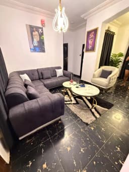 Modern L-Shaped Fabric Sofa Set's Image